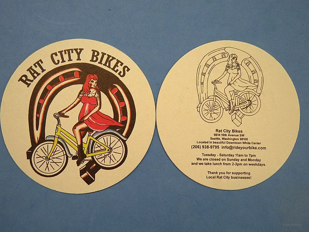 Beer Drink COASTER ~ RAT CITY BIKES Gal Bike Rider ~ Seattle, WA; Bicycle Shop